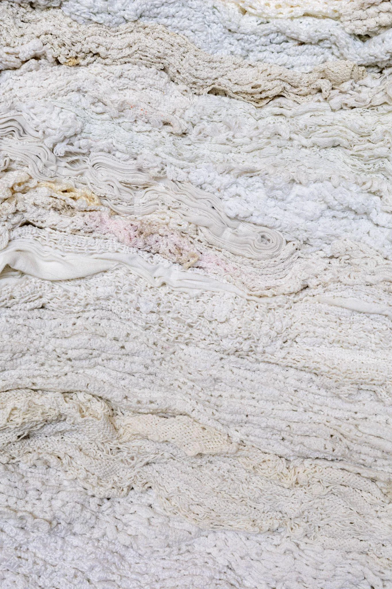 Close detail of layered ivory textile